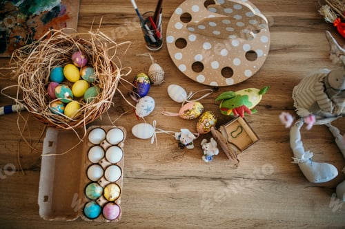 Preview: Preparing for easter celebration with colored eggs and decorations
