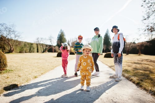 Preview: Mother with four kids at Lednice park, Czech Republic.