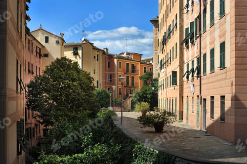 Preview: Colorful facades of buildings with shutters and a courtyard