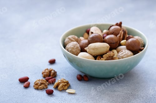 Preview: Bowl of Mixed Nuts on a Soft Surface
