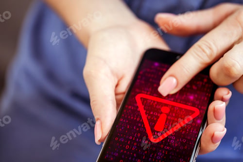 Preview: Mobile phone in female hands with screen showing compromised virus infected device. Cyber attack.