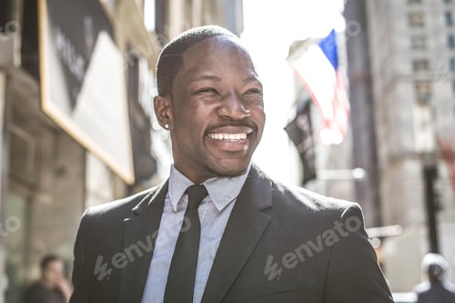 Preview: Confident businessman walking