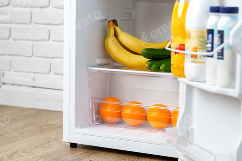 Preview: Open Refrigerator With Fresh Produce and Juice