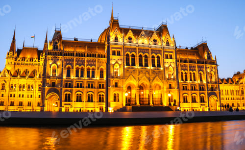 Preview: View on old illuminated building at waterfront