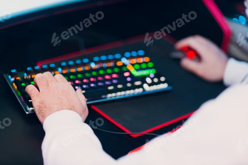 Preview: Guy playing gaming game on computer at game club