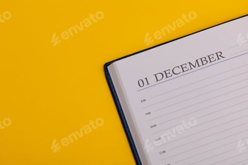 Preview: Notepad or diary with the exact date on a yellow background. Calendar for December 1 - winter time.