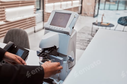 Preview: Optical lens machine, working optometrist and glasses construction of a healthcare worker. Vision a