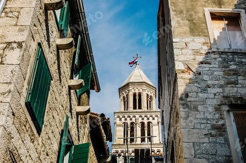 Preview: Old town of Split, medieval city with streets full of tourists and religious buildings.