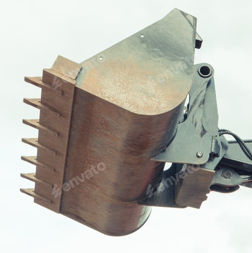 Preview: Old rusty shovel of excavator or bulldozer. Part of hydraulic mechanism using in industrial machine
