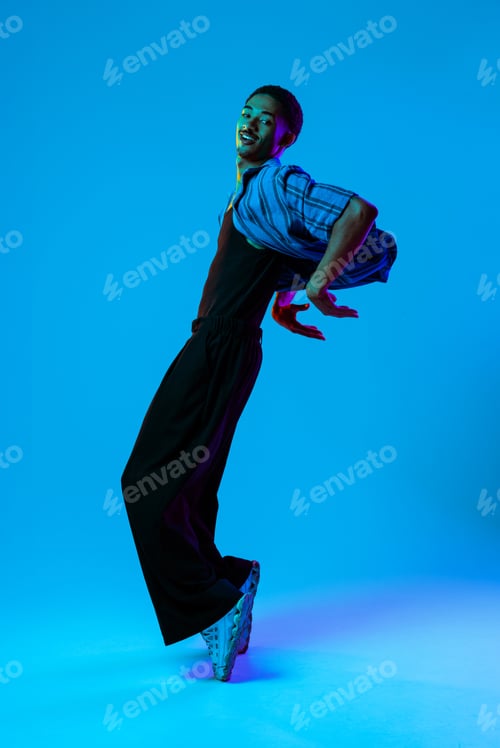 Preview: African man portrait in studio on colorful background