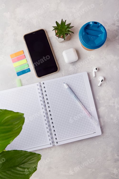 Preview: Neat Desk Vibes - Minimalist Notebook and Pen Arrangement - coffee, sticky stickers, headphones