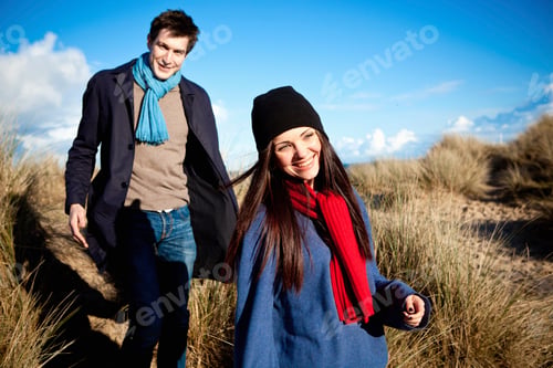 Preview: Two friends enjoying a sunny day at the beach dunes.