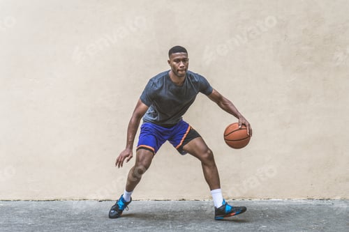Preview: Basketball player training outdoors