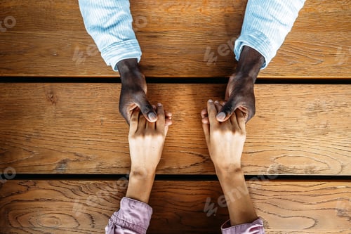 Preview: Handshake between people of different ethnicities, symbolizing trust, harmony, belonging, and unity