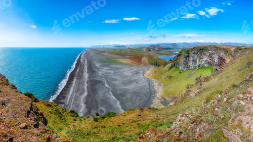 Preview: Impressive View of Kirkjufjara black sand beach from Dyrholaey promontory on Atlantic South Coast