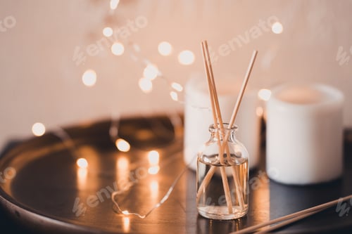 Preview: Liquid home fragrance in aroma sticks with glass bottle closeup.