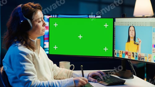 Preview: Photo editor using green screen monitor, listening music