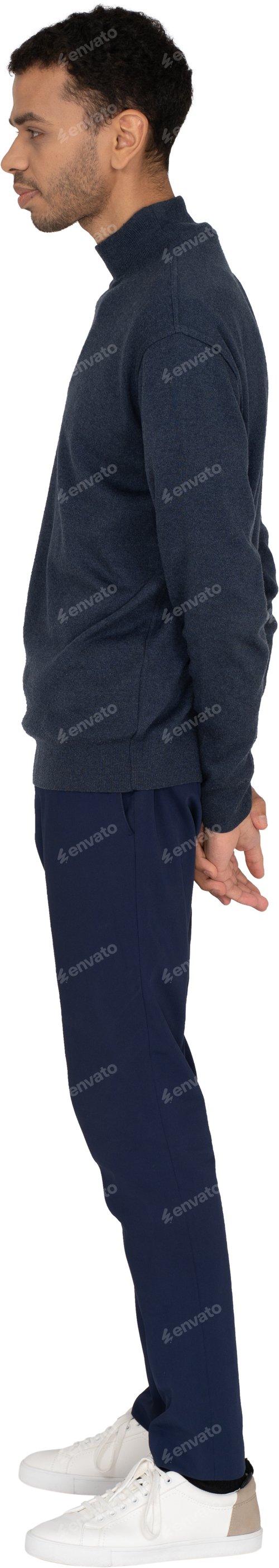 Preview: a man is standing with his hands in his pockets