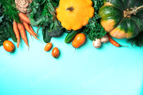 Preview: Autumn vegetables on trendy green background. Top view. Vegan and vegetarian diet, harvest concept