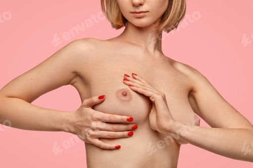 Preview: Health care, medicine, disease and breast cancer awareness concept. Female patient shows breast to m