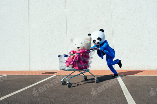 Preview: Storytelling image of a couple wearing giant panda head
