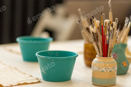 Preview: A lot of various brushes in the art studio.
