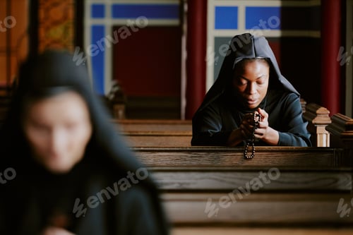 Preview: Nuns Sitting On Bench And Praying To Lord