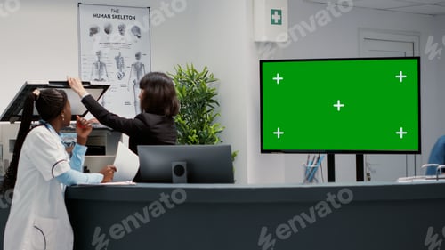 Preview: Waiting area and reception desk with greenscreen on tv display