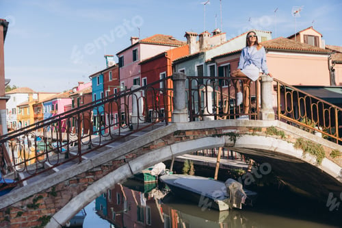 Preview: Woman traveling Burano island Venice Italy enjoying vacation
