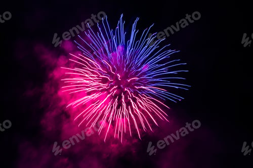 Preview: Low angle shot of colorful fireworks at night - great for wallpapers and backgrounds