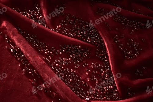 Preview: Abstract background from red beads on red velvet.