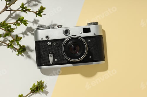 Preview: Concept of leisure and photo hobby with retro photo camera
