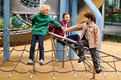 Preview: Joyful childhood moments in autumn at the playground with friends sharing laughter