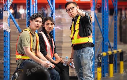 Preview: Group of warehouse employee rest comfortably during work