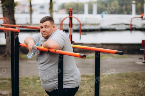 Preview: a fat man drinks water and loses extra pounds by doing sports