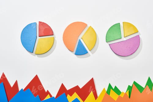 Preview: top view of multicolor statistic graphs and pie charts on white background