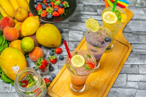 Preview: Strawberry, blueberry, mango Mojito cocktails