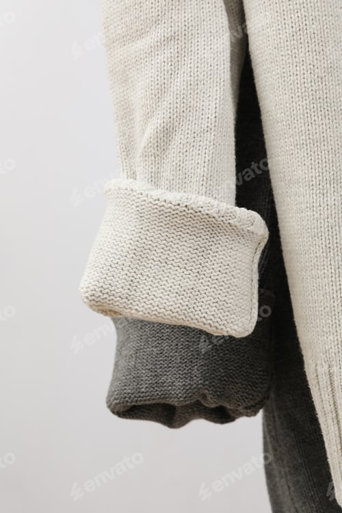 Preview: Hanging sweaters, concept of autumn season clothes