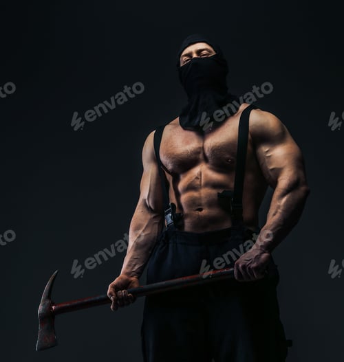 Preview: Muscular man in mask holding axe