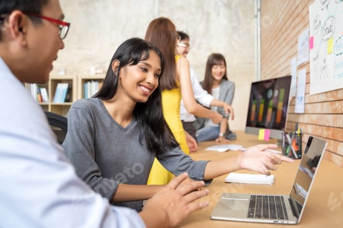 Preview: Group of Asian business people team meeting in modern office