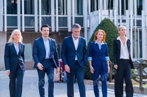 Preview: Executives Having Fun: Five Professionals Laughing and Walking in Commercial Buildings Area