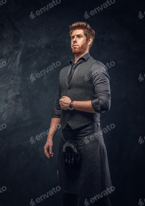 Preview: Portrait of a handsome redhead man with stylish hair and beard in studio
