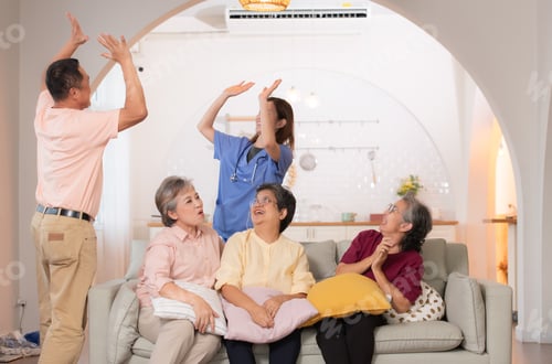 Preview: Group of Asian senior and caregiver having fun in the nursing home.