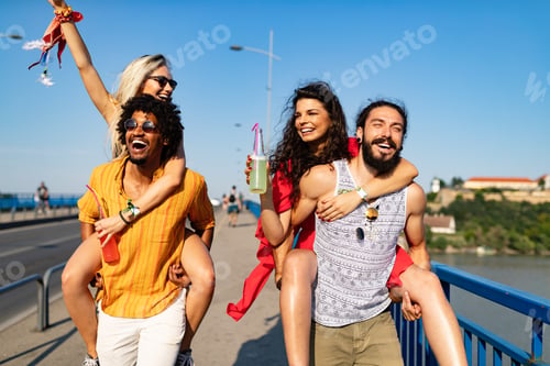 Preview: Group of friends having fun time at music festival