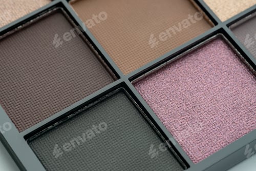 Preview: Make-up palette close up. Professional multicolor eye shadow make-up palette. Cosmetic products