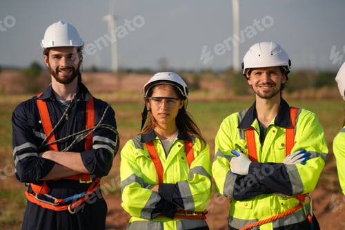 Preview: Sustainable energy industry - Engineers working at alternative renewable wind energy farm