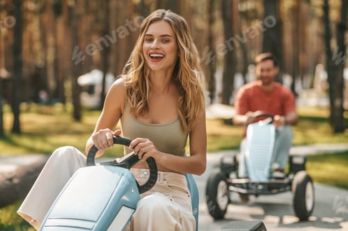 Preview: A young couple having a riding competion and looking enjoyed
