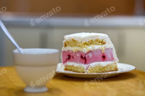Preview: Delicious Layered Cake Slice with Berries and Frosting