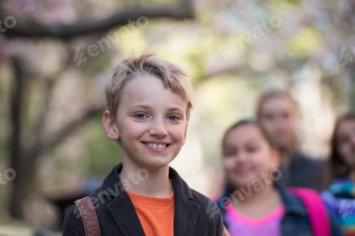 Preview: Spring in the city,A group of children on the sidewalk,carrying bags.