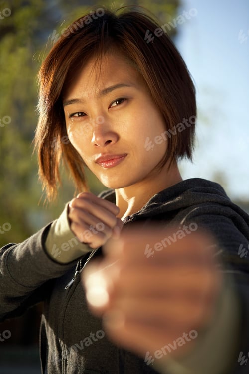 Preview: Young Woman Practicing Martial Arts